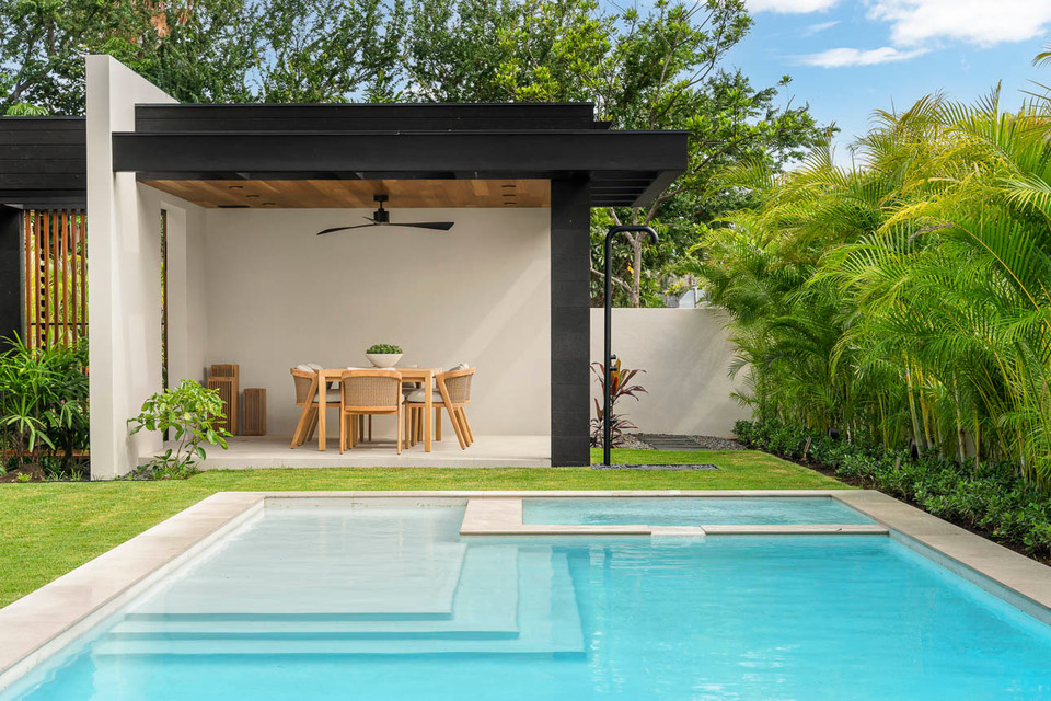 Pool and garden pavilion at a contemporary Hawaiʻi residence.
