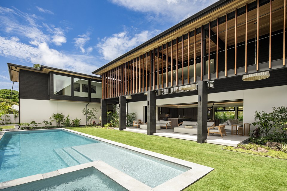 Pool courtyard connecting the two-story residence and garden pavilion.