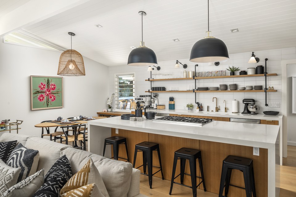 Calm, light-filled kitchen with refined natural finishes.